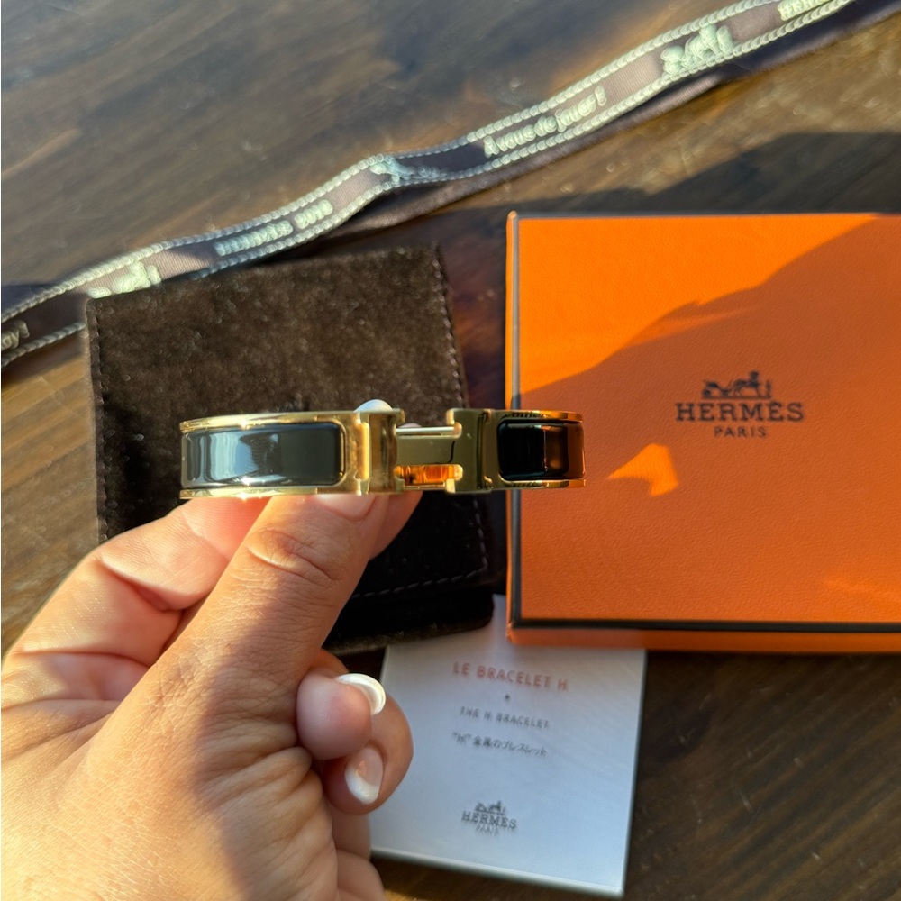 Hermès Black and Gold Bracelet